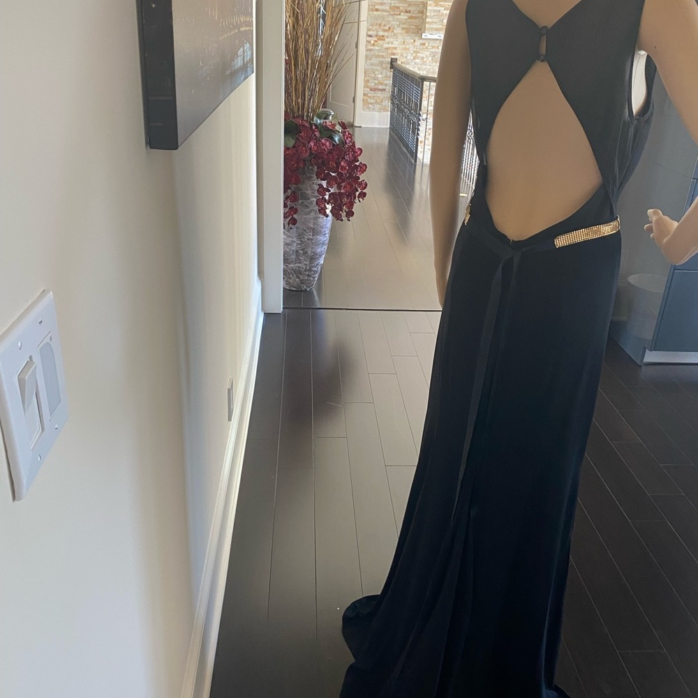 Stunning black dress with gold belt